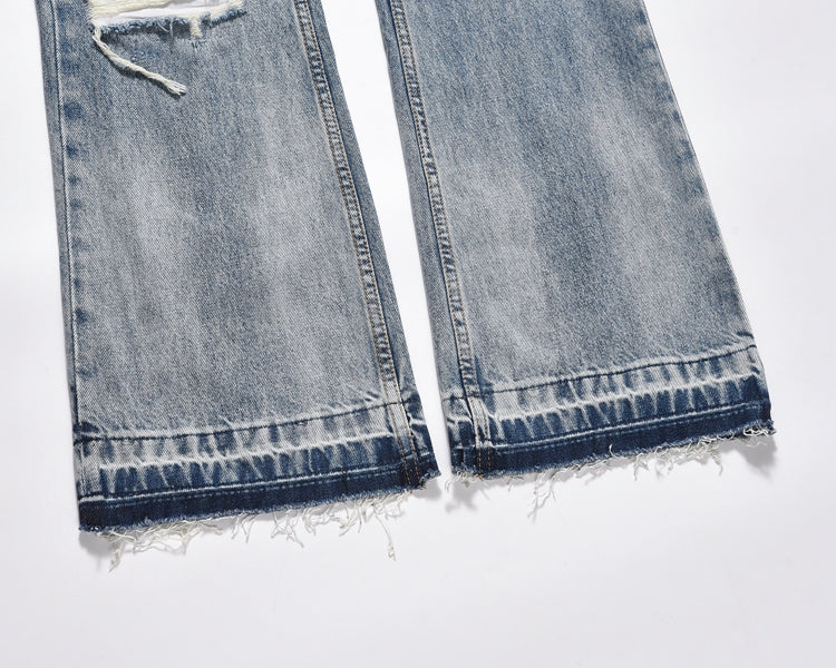 IAC | Flared distressed denim