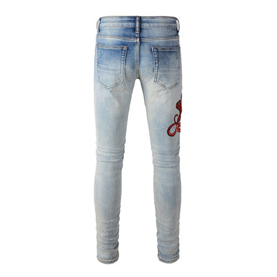 IAC | Red Orton skinny jeans