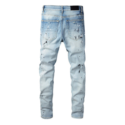 IAC | Black slightly painted skinny light blue jeans