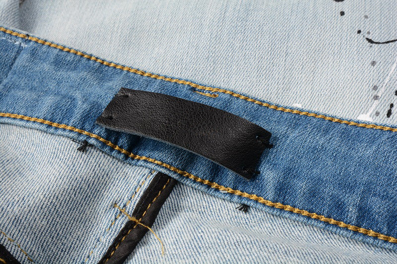 IAC | Black slightly painted skinny light blue jeans