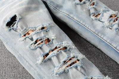 IAC | Orange side skinny light blue jeans