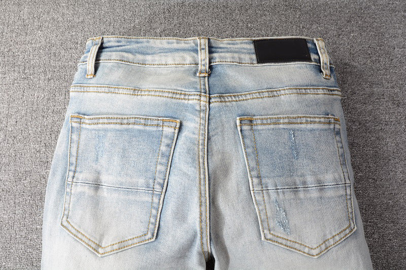 IAC | Orange side skinny light blue jeans