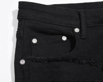IAC | DISTRESSED BLACK PANTS